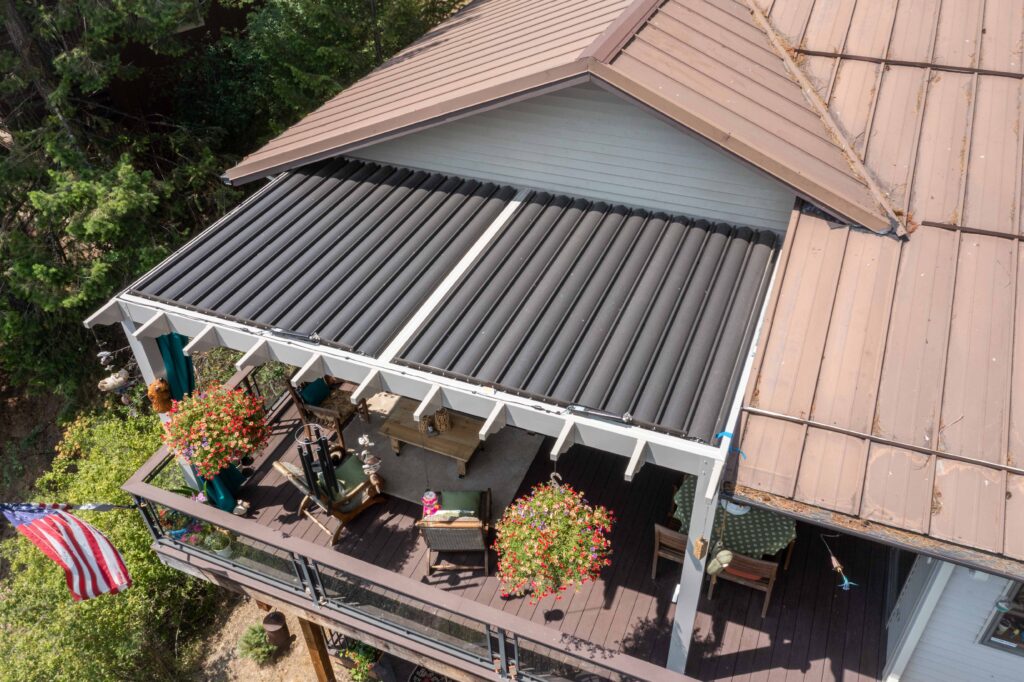 picture of a tan sundance louvered pergola and closed bronze louvers with pergola cuts for style from above