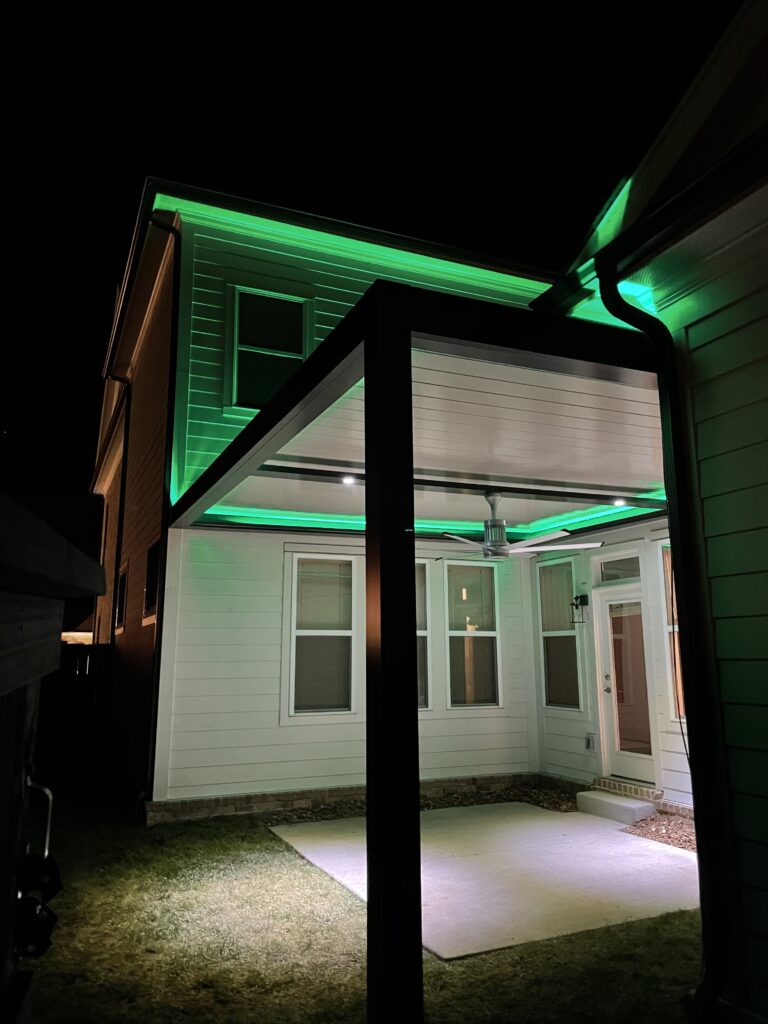 picture of sundance louvered pergola install with fan beam and led lighting