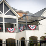 Fixed screens in arch, retractable screens, and louvered pergola