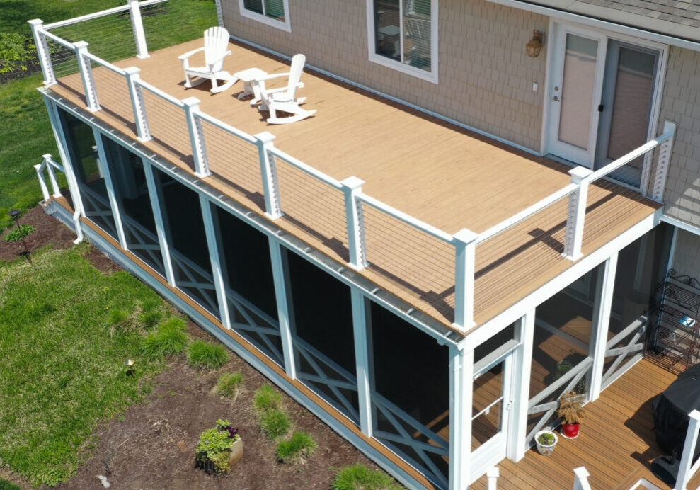 picture of duxxbak composite decking install on a patio to create a dry-below space